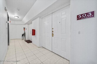 8954 Puerto Del Rio Dr in Cape Canaveral, FL - Building Photo - Building Photo