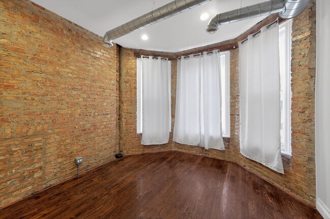 7038 S Eberhart Ave, Unit 1 in Chicago, IL - Building Photo - Building Photo