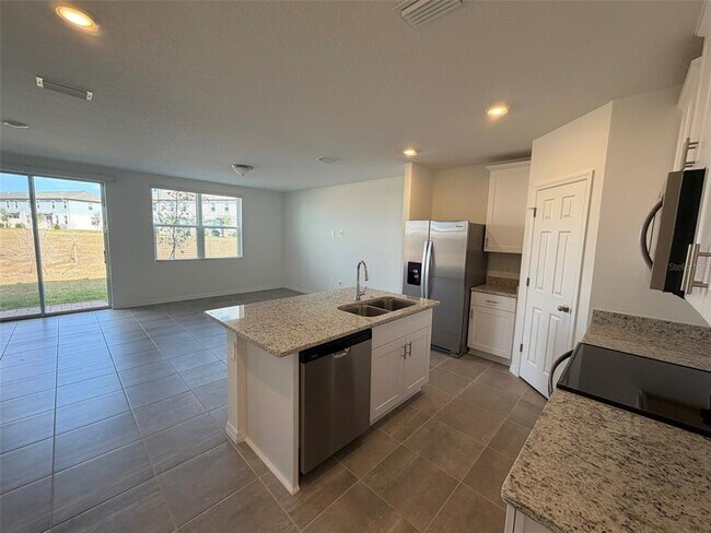 16462 Bird of Paradise Ave in Clermont, FL - Building Photo - Building Photo