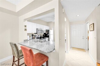 1044 Woodshire Ln in Naples, FL - Building Photo - Building Photo