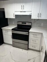 5011 Wiles Rd in Coconut Creek, FL - Building Photo - Building Photo