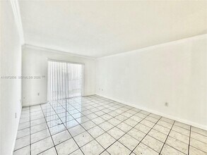 4275 NW South Tamiami Canal Dr, Unit 2-104 in Miami, FL - Building Photo - Building Photo