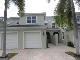 1305 Mariposa Cir, Unit 202 in Naples, FL - Building Photo