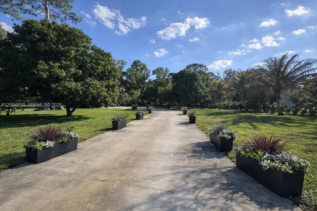 16932 Calder Dr W in The Acreage, FL - Building Photo - Building Photo