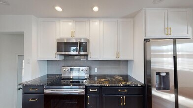 Classic brick Montclair home with covered in Denver, CO - Building Photo - Building Photo