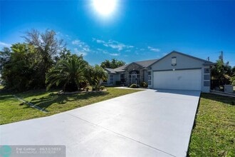 1580 SW Santander Ave in Port St. Lucie, FL - Building Photo - Building Photo