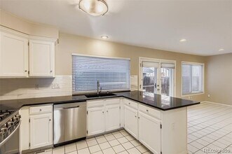 7572 S Rosemary Cir in Centennial, CO - Building Photo - Building Photo
