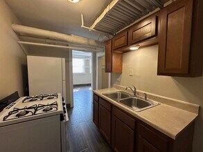 Freshly Renovated 2BR Garden Apartment Near UWM $1,350/mo – Heat + Parking Included in Milwaukee, WI - Building Photo - Building Photo