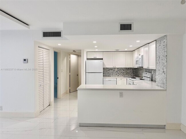 property at 5415 Collins Ave