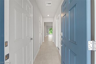 15319 Wildflower Cir in Naples, FL - Building Photo - Building Photo