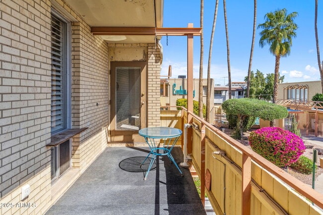 property at 6928 E 3rd St