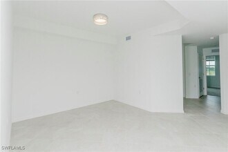 18461 Copperhead Dr, Unit 421 in Lehigh Acres, FL - Building Photo - Building Photo