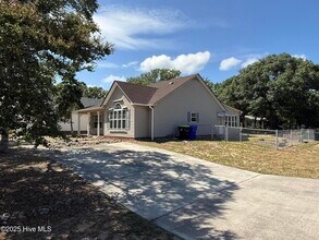 1308 E Oak Island Dr in Oak Island, NC - Building Photo - Building Photo