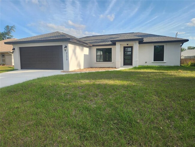 21319 Quesada Ave in Port Charlotte, FL - Building Photo - Building Photo