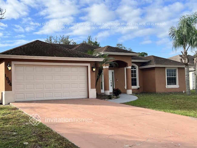 1584 SW Paar Dr in Port St. Lucie, FL - Building Photo - Building Photo