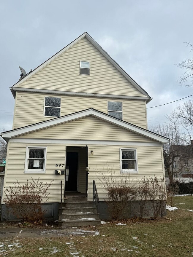 property at 647 E 117th St