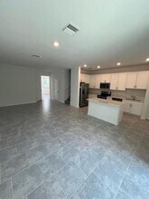 7640 Stone Crk Trl in Kissimmee, FL - Building Photo - Building Photo