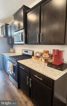8760 Mimosa Ave in Clinton, MD - Foto de edificio - Building Photo