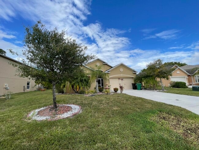 property at 5079 NW Fiddle Leaf Ct