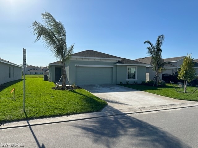 12142 Amber Waves Rd in Lehigh Acres, FL - Building Photo