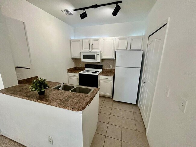 6137 Metrowest Blvd-Unit -304 in Orlando, FL - Building Photo - Building Photo