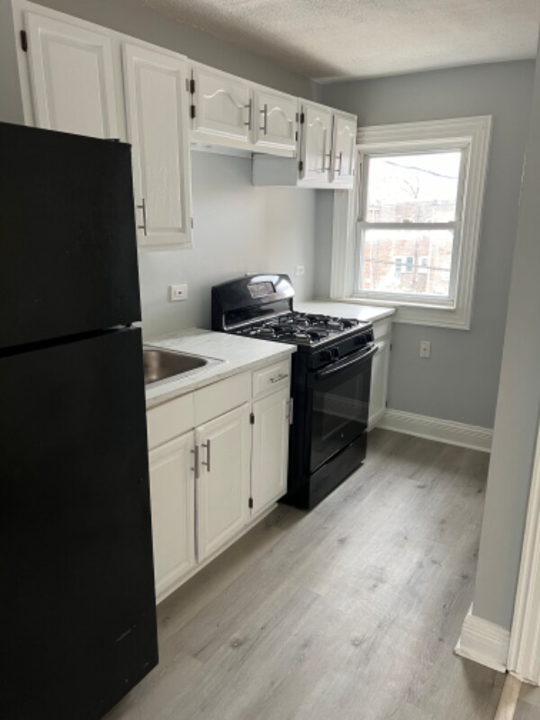 1614 Popland St-Unit -B in Baltimore, MD - Building Photo - Building Photo