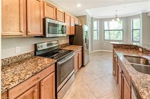 9826 Giaveno Cir-Unit -1516 in Naples, FL - Building Photo