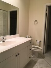9125 W Highland Pines Dr, Unit 9119 DUPLEX APT in Palm Beach Gardens, FL - Foto de edificio - Building Photo