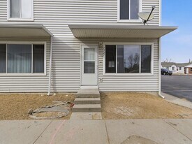 Spacious Townhome with Functional Layout in Evans, CO - Building Photo