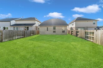 1426 Northwood Blf Ln in Pinehurst, TX - Building Photo - Building Photo