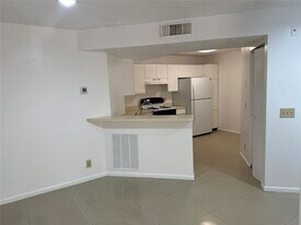 8801 Wiles Rd in Coral Springs, FL - Building Photo