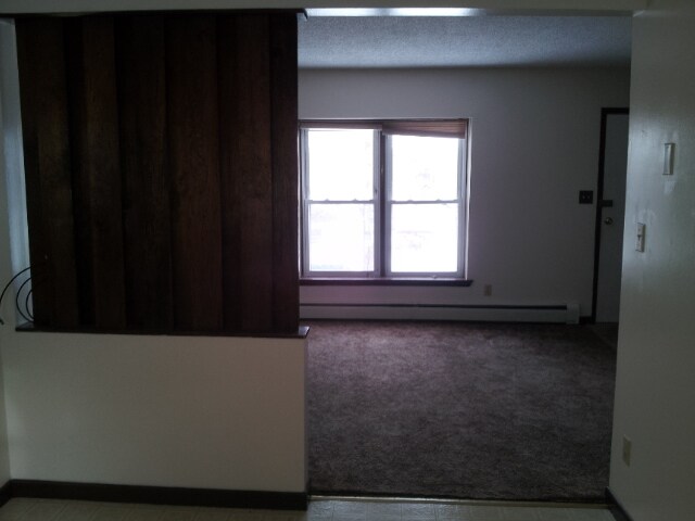 296 Duer St, Unit A in Oswego, NY - Foto de edificio - Building Photo