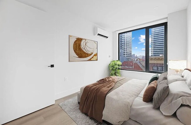 215 E 124th St in New York, NY - Building Photo - Building Photo