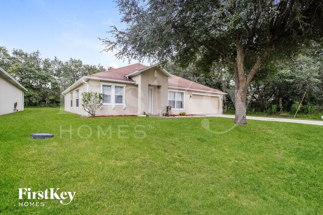 1932 Michigan Ct in Poinciana, FL - Foto de edificio - Building Photo