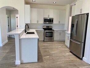 11642 Royal Tee Cir in Cape Coral, FL - Building Photo - Building Photo