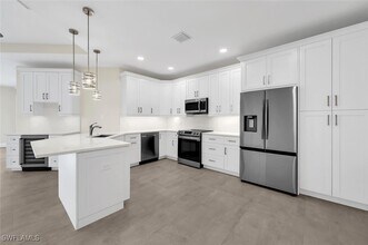 11412 Quail Village Way in Naples, FL - Building Photo - Building Photo