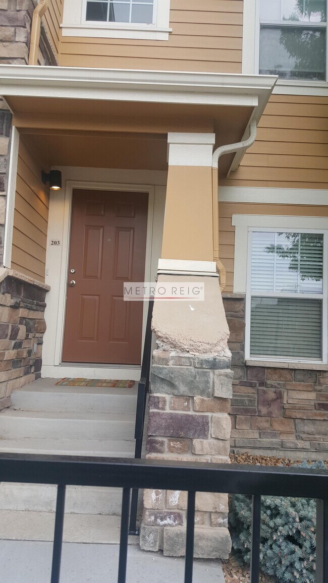 7120 Simms St-Unit -203 in Arvada, CO - Building Photo - Building Photo