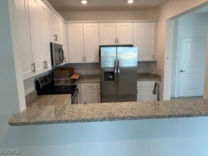 14204 Pine Lodge Ln in Miromar Lakes, FL - Building Photo - Building Photo