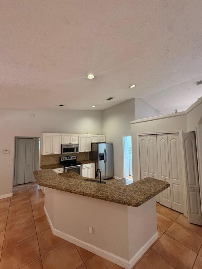 16192 71st Ln N in The Acreage, FL - Foto de edificio - Building Photo