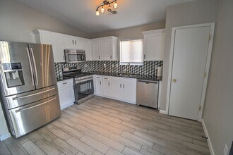 11605 Signing Arrow Rd in Albuquerque, NM - Building Photo - Building Photo