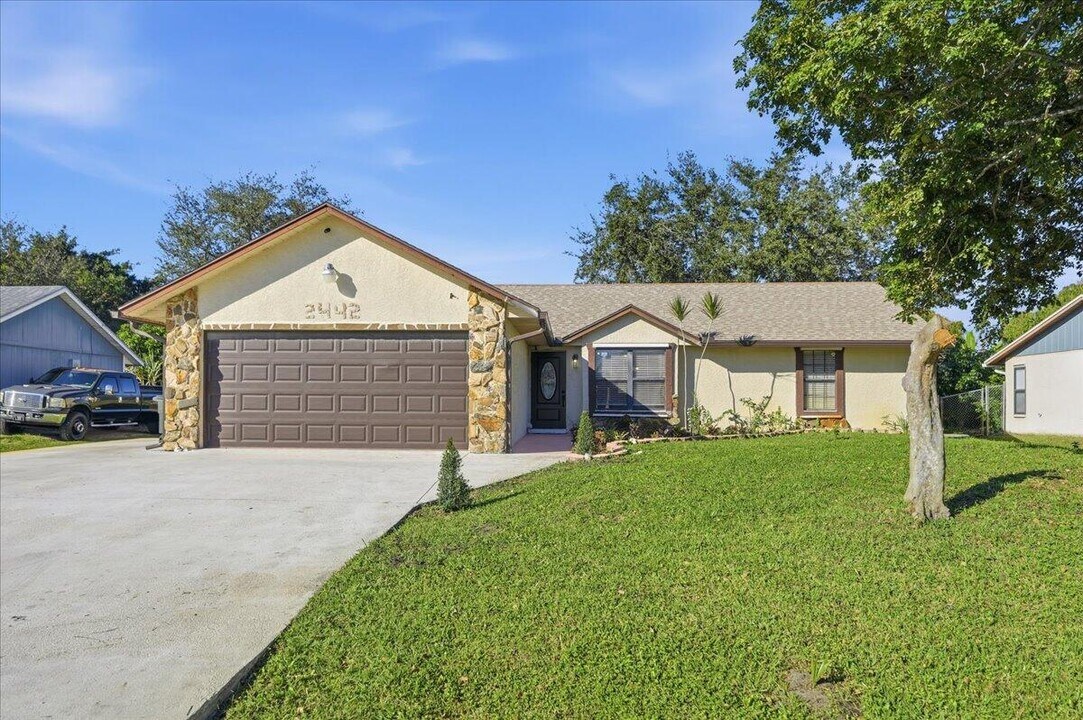 2442 SW Lafayette St in Port St. Lucie, FL - Building Photo