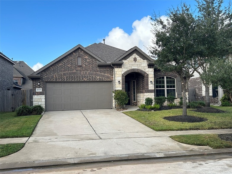 16619 Cactus Blossom Trail, Unit 1F in Cypress, TX - Building Photo