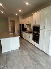 11717 Canopy Loop in Miromar Lakes, FL - Building Photo - Building Photo