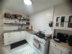 1445 W 52nd St, Unit UP in Cleveland, OH - Foto de edificio - Building Photo