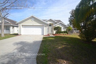 1124 Cedarwood Way in Clermont, FL - Building Photo