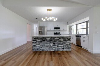 2381 SE Aneci St in Port St. Lucie, FL - Building Photo - Building Photo