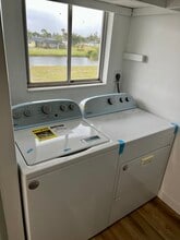 146 Boundary Blvd, Unit B203 in Rotonda West, FL - Building Photo - Building Photo