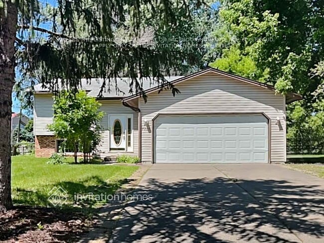 property at 7701 Queen Ave N