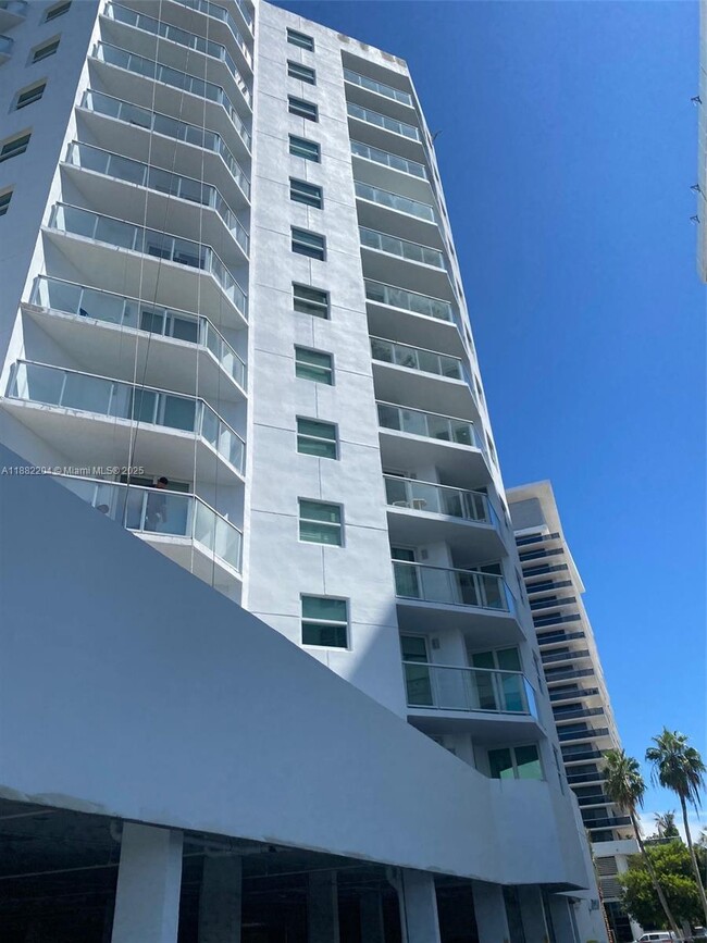 property at 5880 Collins Ave