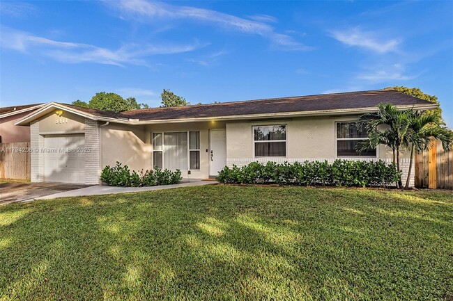 property at 8411 NW 3rd St